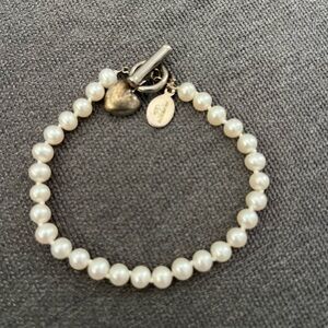 Elegant Pearl Bracelet with Heart Charm